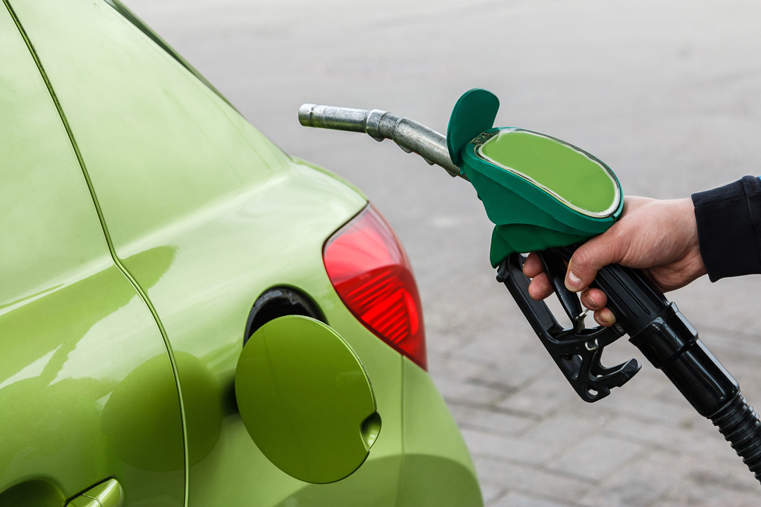 man-fills-up-his-car-with-a-gasoline-2023-05-11-22-06-47-utc